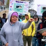 people marching at an action